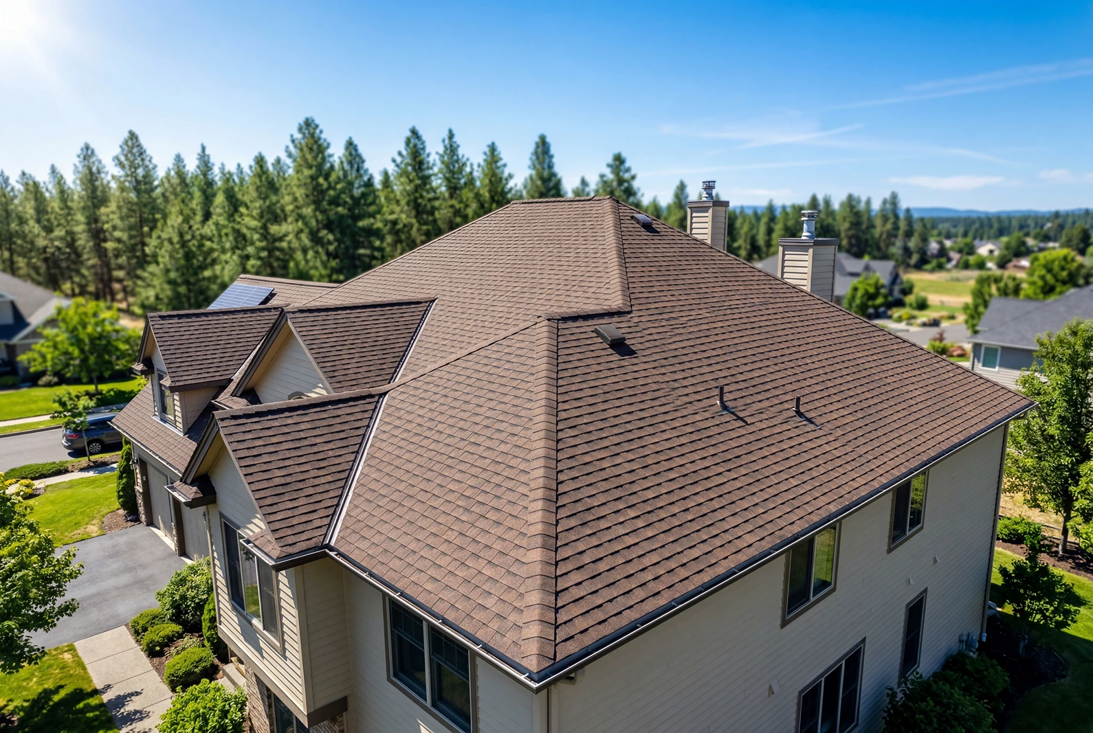 2026 09 11T15 36 45.493927Z well maintained brown asphalt shingle roof on suburban home photo